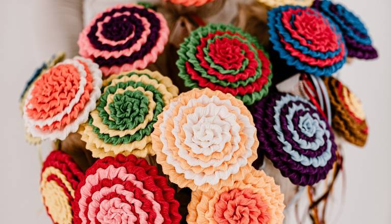 Pustne rože in slikanica o fašenku na Ptujskem gradu