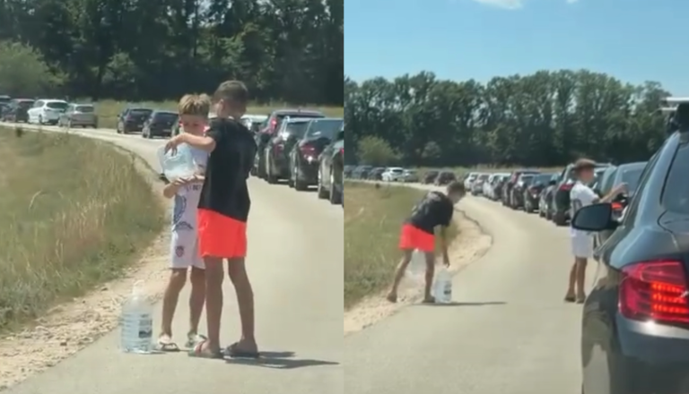 VIDEO: Mala junaka v veliki vročini! Tako sta potnikom v koloni delila hladno vodo